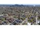 Aerial view showcasing the property's location near downtown, a vibrant city skyline, and cozy neighborhood at 2135 W 40Th Ave, Denver, CO 80211
