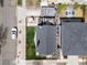 Aerial view showing the roof, yard, patio, and surrounding neighborhood of the house at 2135 W 40Th Ave, Denver, CO 80211