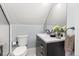 Charming bathroom featuring a vanity with marble countertops, a modern faucet, and a stylish mirror at 2135 W 40Th Ave, Denver, CO 80211