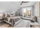 Bedroom with a walkout balcony and neutral decor at 2135 W 40Th Ave, Denver, CO 80211