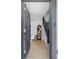 Inviting entryway with hardwood floors, a staircase, and a view into the home at 2135 W 40Th Ave, Denver, CO 80211