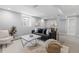 Inviting living room with a plush sofa, a marble coffee table, and stylish accents, ideal for relaxation at 2135 W 40Th Ave, Denver, CO 80211