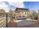 Relax on this comfortable patio with stylish furniture and views of the surrounding neighborhood and the sky at 2135 W 40Th Ave, Denver, CO 80211