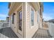 Corner view from balcony showing the homes exterior with a door to the inside at 46566 Avery Ln, Bennett, CO 80102