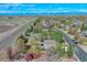 Lovely home with mature trees, a fenced yard, and mountain views beyond at 6800 Saddleback Ave, Firestone, CO 80504