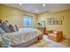 This bedroom features carpeted floors, neutral walls, and natural light at 6800 Saddleback Ave, Firestone, CO 80504