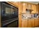 Modern kitchen with stainless steel appliances and ample cabinet space at 6800 Saddleback Ave, Firestone, CO 80504