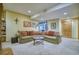 Finished basement featuring a comfortable living room with carpeted floors and cozy furnishings at 6800 Saddleback Ave, Firestone, CO 80504