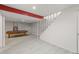 Recreational area featuring a pool table and staircase, offering a versatile space for leisure and relaxation at 977 S Reed St, Lakewood, CO 80226