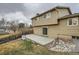 Backyard patio with outdoor furniture, grill, and landscaped yard at 9014 W Harvard Dr, Lakewood, CO 80227