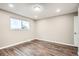 Bright and airy bedroom with hardwood floors and ample natural light at 9014 W Harvard Dr, Lakewood, CO 80227