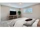 Spacious bedroom with a large bed and plenty of natural light at 9014 W Harvard Dr, Lakewood, CO 80227