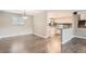 Bright dining room featuring hardwood floors and kitchen views at 9014 W Harvard Dr, Lakewood, CO 80227