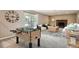 Gathering room with a fireplace and foosball table at 9014 W Harvard Dr, Lakewood, CO 80227