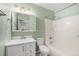 Small bathroom with toilet, shower and tub combo, and single sink vanity at 1273 S Crystal Way, Aurora, CO 80012
