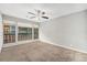 Spacious bedroom featuring carpet floors, many windows, and great natural light at 1273 S Crystal Way, Aurora, CO 80012