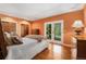Cozy bedroom featuring hardwood floors, ample natural light, and stylish furnishings for a peaceful retreat at 474 Silbrico Way, Castle Rock, CO 80108