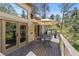 Spacious wooden deck with views of the trees, offering a serene outdoor space to relax and unwind at 474 Silbrico Way, Castle Rock, CO 80108