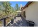 Spacious deck with room for outdoor seating and dining, ideal for enjoying the surrounding nature and scenery at 474 Silbrico Way, Castle Rock, CO 80108