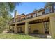 Two-story home with a covered patio, a second-story terrace, and great outdoor living spaces at 474 Silbrico Way, Castle Rock, CO 80108
