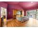 Inviting bedroom suite features a private balcony and large closet at 474 Silbrico Way, Castle Rock, CO 80108