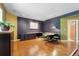 Bright office space with hardwood floors, modern lighting, and ample room for a productive work environment at 474 Silbrico Way, Castle Rock, CO 80108