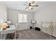 This room has a large window, and a ceiling fan providing a comfortable and bright area at 2637 Gray Wolf Pl, Castle Rock, CO 80104