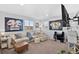 Comfortable living room with natural light, plush seating, and tasteful decor; perfect for relaxation and entertainment at 2637 Gray Wolf Pl, Castle Rock, CO 80104
