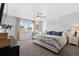 Inviting main bedroom with a cozy bed, soft lighting, and a bright window; perfect for relaxation and restful nights at 2637 Gray Wolf Pl, Castle Rock, CO 80104