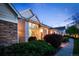 Beautiful exterior of a well-lit building, complemented by lush greenery and a serene atmosphere at 8300 Fairmount Dr # Qq102, Denver, CO 80247
