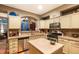 Functional kitchen with stainless steel appliances, neutral countertops, and open layout at 8300 Fairmount Dr # Qq102, Denver, CO 80247