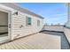 Spacious rooftop deck offers sunny skies and expansive views, perfect for outdoor entertaining or relaxation at 888 S Valentia St # 103, Denver, CO 80247