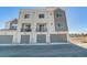 New construction townhomes featuring private garages and individual balconies at 888 S Valentia St # 103, Denver, CO 80247