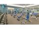Community fitness center with blue workout benches and a variety of fitness machines at 888 S Valentia St # 103, Denver, CO 80247