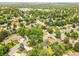 Aerial view showcasing the neighborhood's mature trees, well-maintained streets, and proximity to local amenities at 3736 S Hibiscus Way, Denver, CO 80237