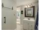 Bathroom features a decorative sink and vanity with bronze fixtures at 4416 Brentwood St, Wheat Ridge, CO 80033