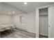 The cozy bedroom features new flooring, a closet, and a window that brings in natural light at 4416 Brentwood St, Wheat Ridge, CO 80033