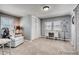 Cozy bedroom featuring neutral walls, carpet, and a closet for ample storage space at 4416 Brentwood St, Wheat Ridge, CO 80033