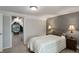 Cozy bedroom with an open door to a reading room at 4416 Brentwood St, Wheat Ridge, CO 80033