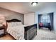 Cozy bedroom with a comfortable bed, closet and neutral color scheme at 4416 Brentwood St, Wheat Ridge, CO 80033