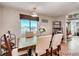Bright dining room with a large window and a view to outside at 4416 Brentwood St, Wheat Ridge, CO 80033