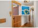 Hallway of the home features a unique, split door design at 5285 E Iliff Ave, Denver, CO 80222