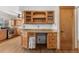 Kitchen nook with wood cabinets and granite countertops at 5285 E Iliff Ave, Denver, CO 80222