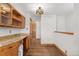 Kitchen nook with wood cabinets and countertops at 5285 E Iliff Ave, Denver, CO 80222