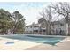 Exterior view of the pool area with the community building in the background at 13241 E Asbury Dr # 203, Aurora, CO 80014