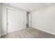 Bedroom with a closet, carpet floors, and natural light at 17125 W 92Nd Loop, Arvada, CO 80007
