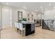 Bright dining area with wood floors, black accents, and large windows that let in natural light at 17125 W 92Nd Loop, Arvada, CO 80007