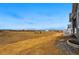 New construction home highlighting a lot with a partial view and a small water feature at 17125 W 92Nd Loop, Arvada, CO 80007