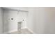 Bright laundry room features washer and dryer hookups and tile flooring at 17125 W 92Nd Loop, Arvada, CO 80007