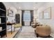 Cozy living room with plush seating, neutral decor, and a bright, inviting atmosphere at 17125 W 92Nd Loop, Arvada, CO 80007
